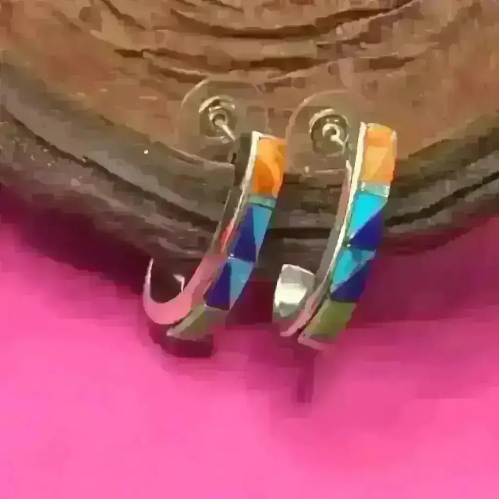 Silver inlaid earrings from Crownpoint Navajo made