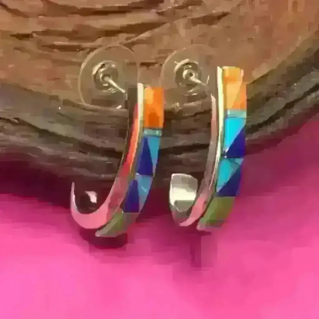 Silver inlaid earrings from Crownpoint Navajo made