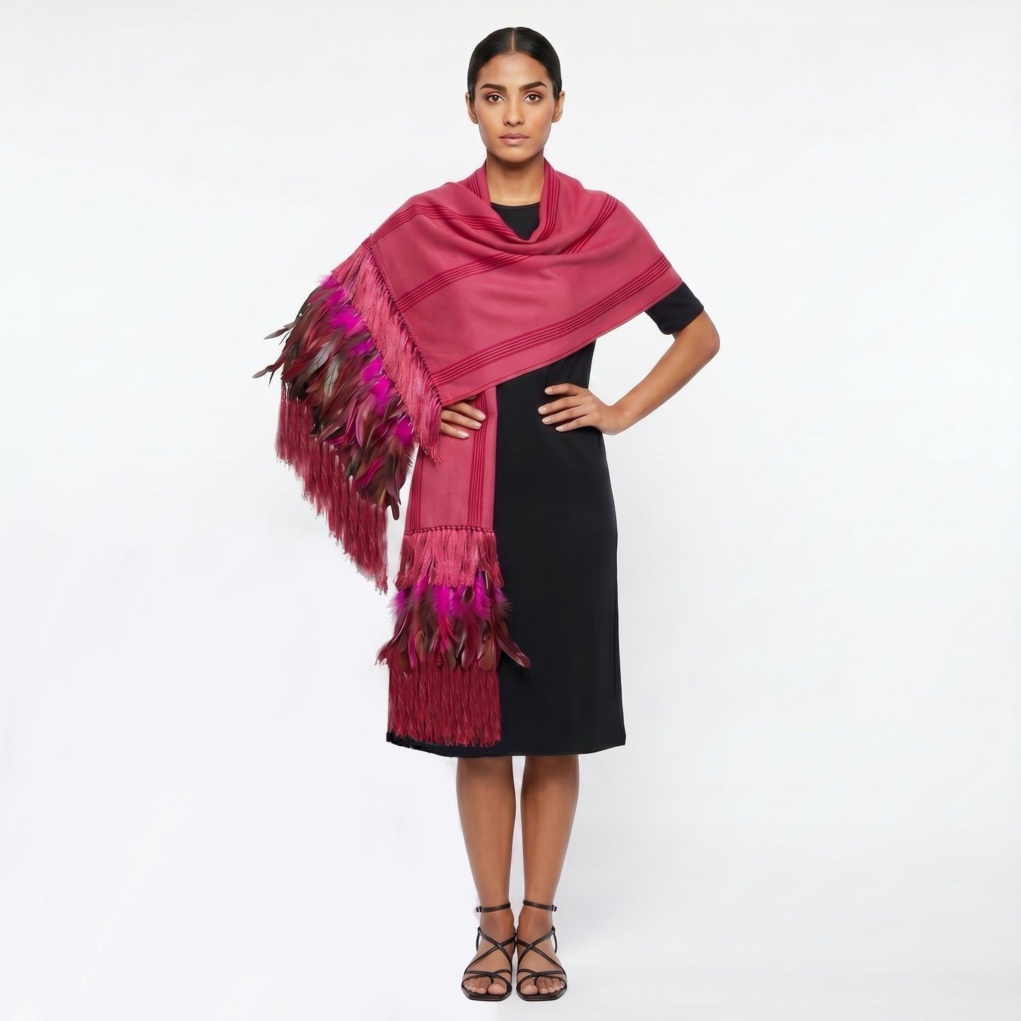 Purepecha rebozo shawl handwoven on backstrap loom in Michoacán with silk rapacejo fringe and natural feathers