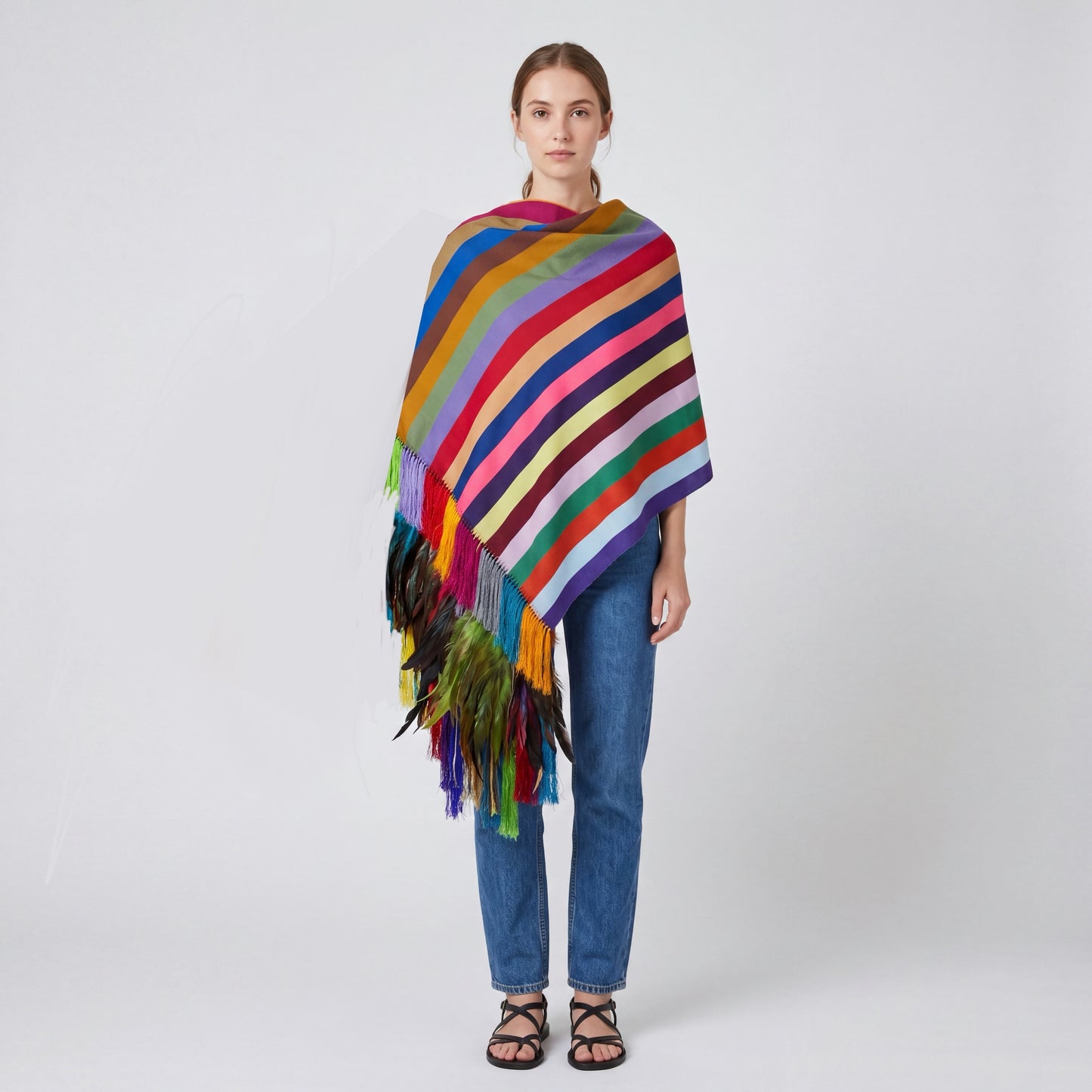 Multi-stripe Purepecha rebozo shawl from Michoacán, handwoven on backstrap loom with silk fringe and natural feathers