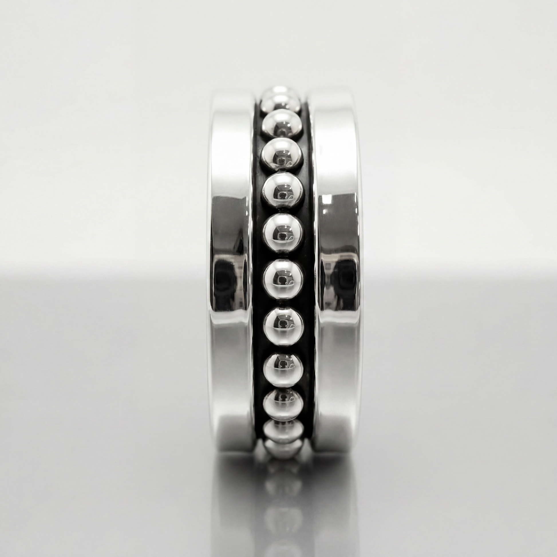 Silver Taxco bracelet, modern design with dots-clamper style.
