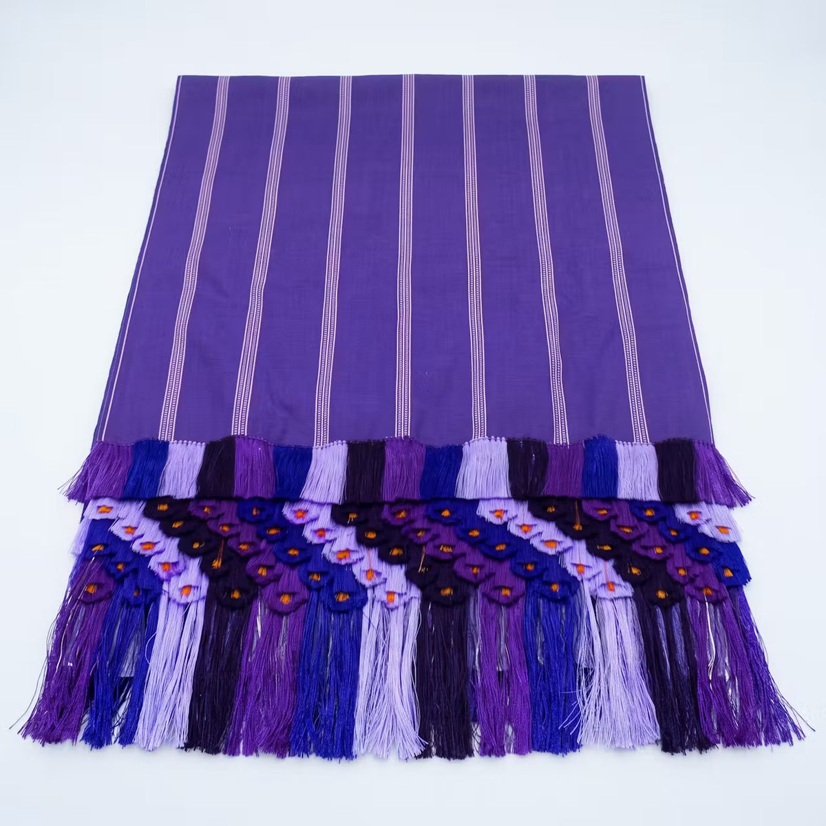 Purple stripe Purepecha rebozo with fringe or ‘flowers’.
