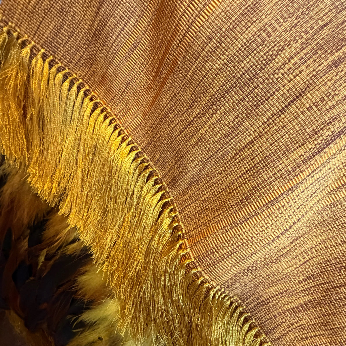 Mustard Purepecha Rebozo with fringe and feathers from Michoacán.