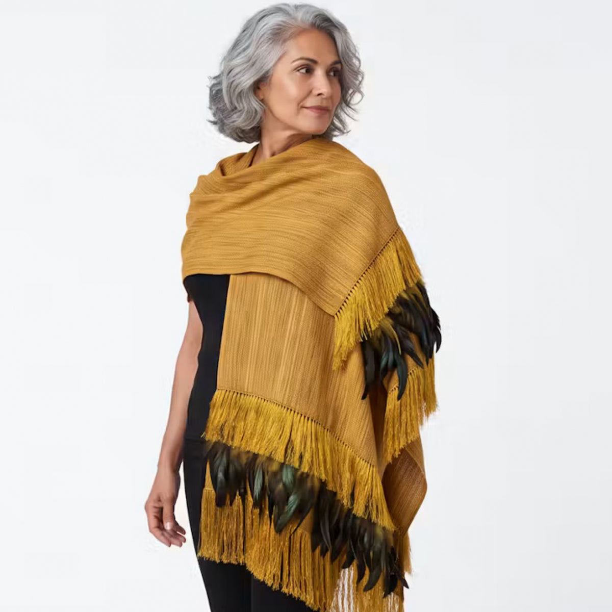 Mustard Purepecha Rebozo with fringe and feathers from Michoacán.