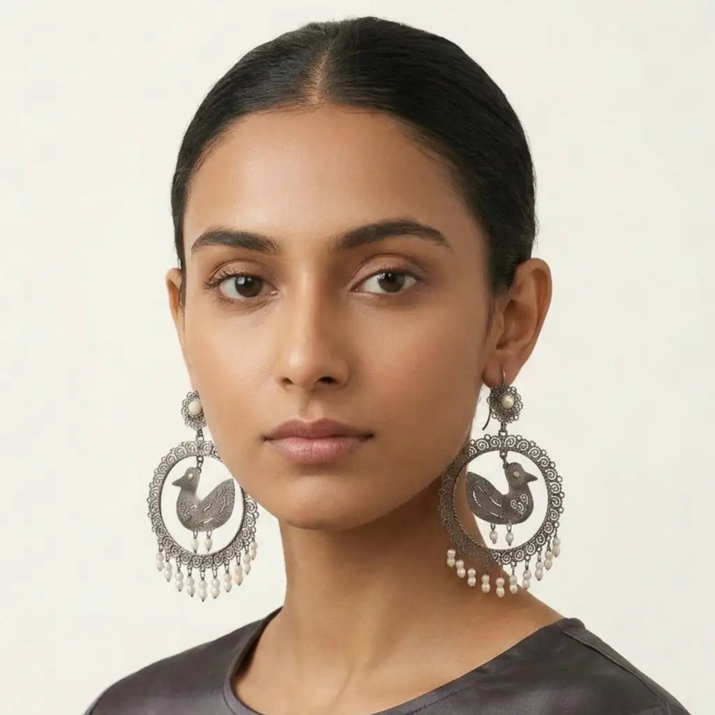 Bird earrings with pearls