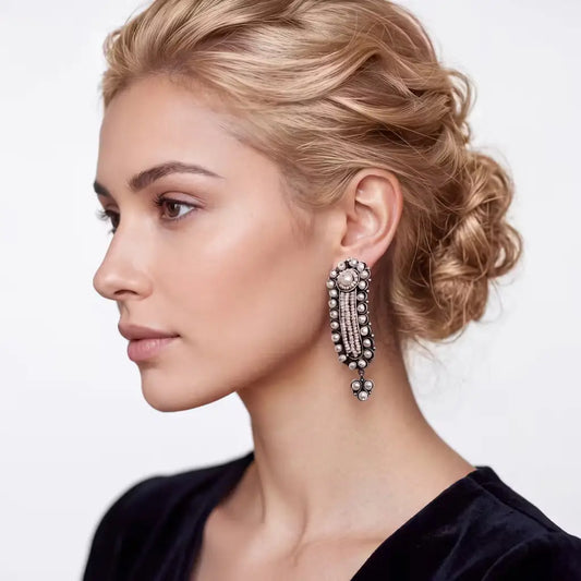 Gusano pearl and silver earrings with seed pearls