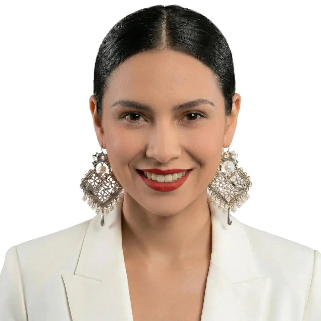 Mexican Mazahua silver dove earrings with coral
