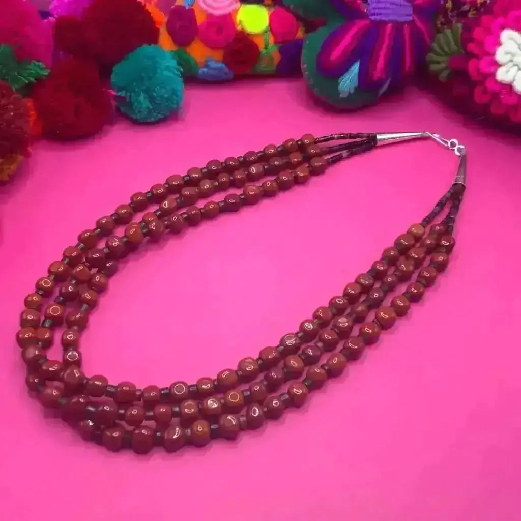 Santo Domingo coral heshi}three strand hand beaded necklace