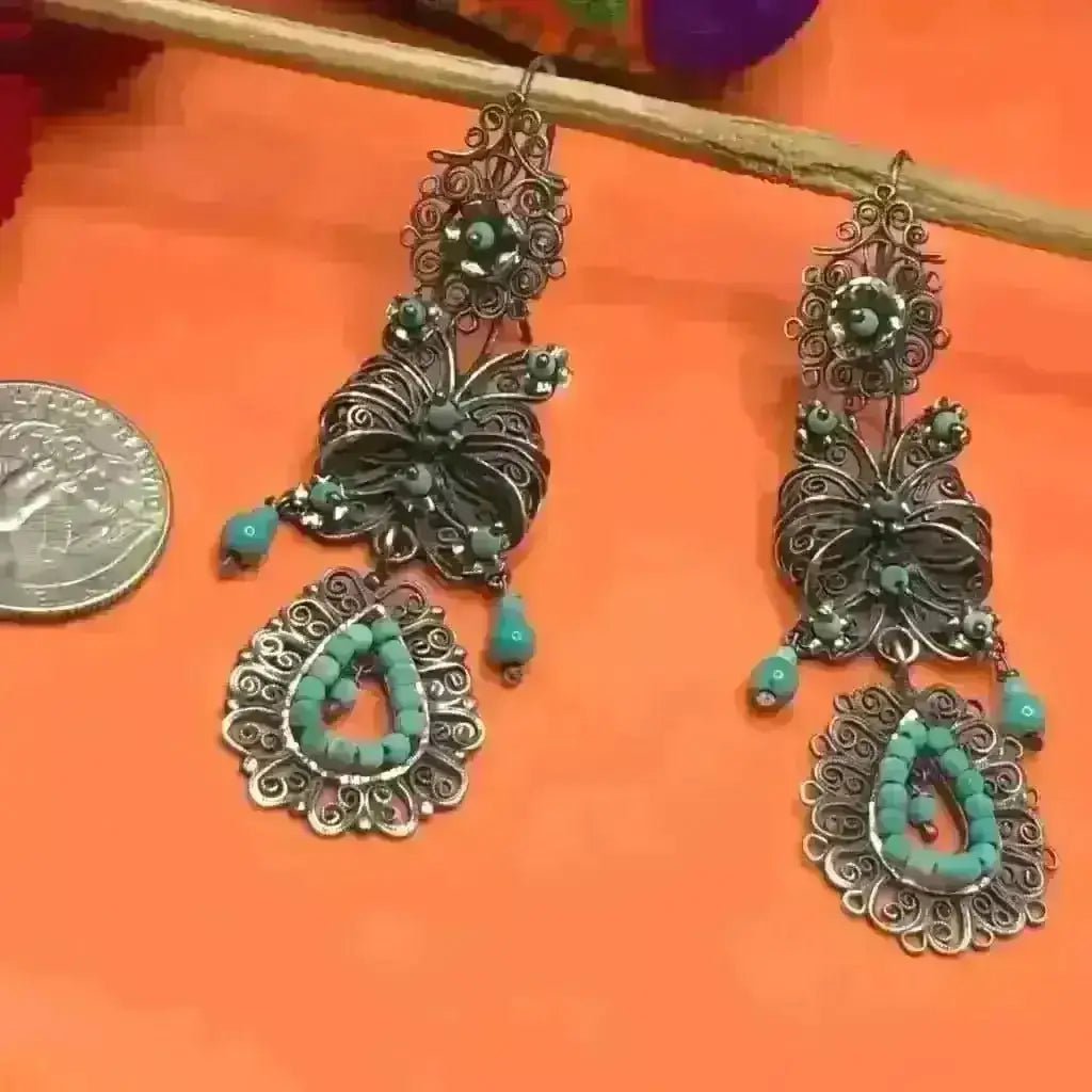 Traditional Mexican silver filigree earrings with turquoise