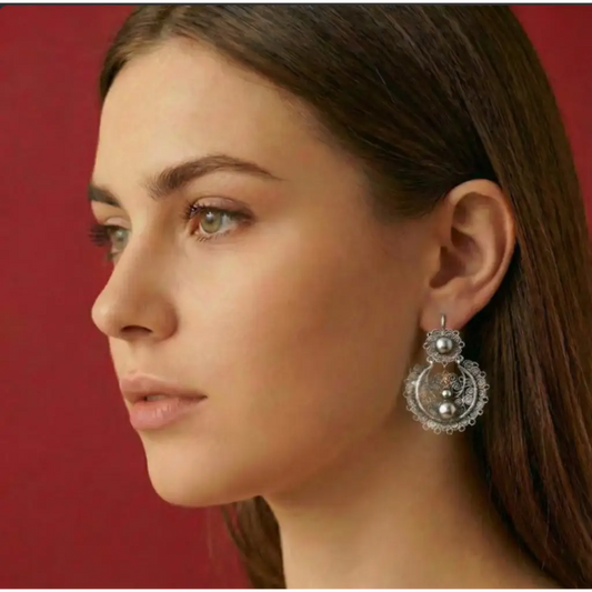 Traditional Oaxacan earrings with silver ball decoration